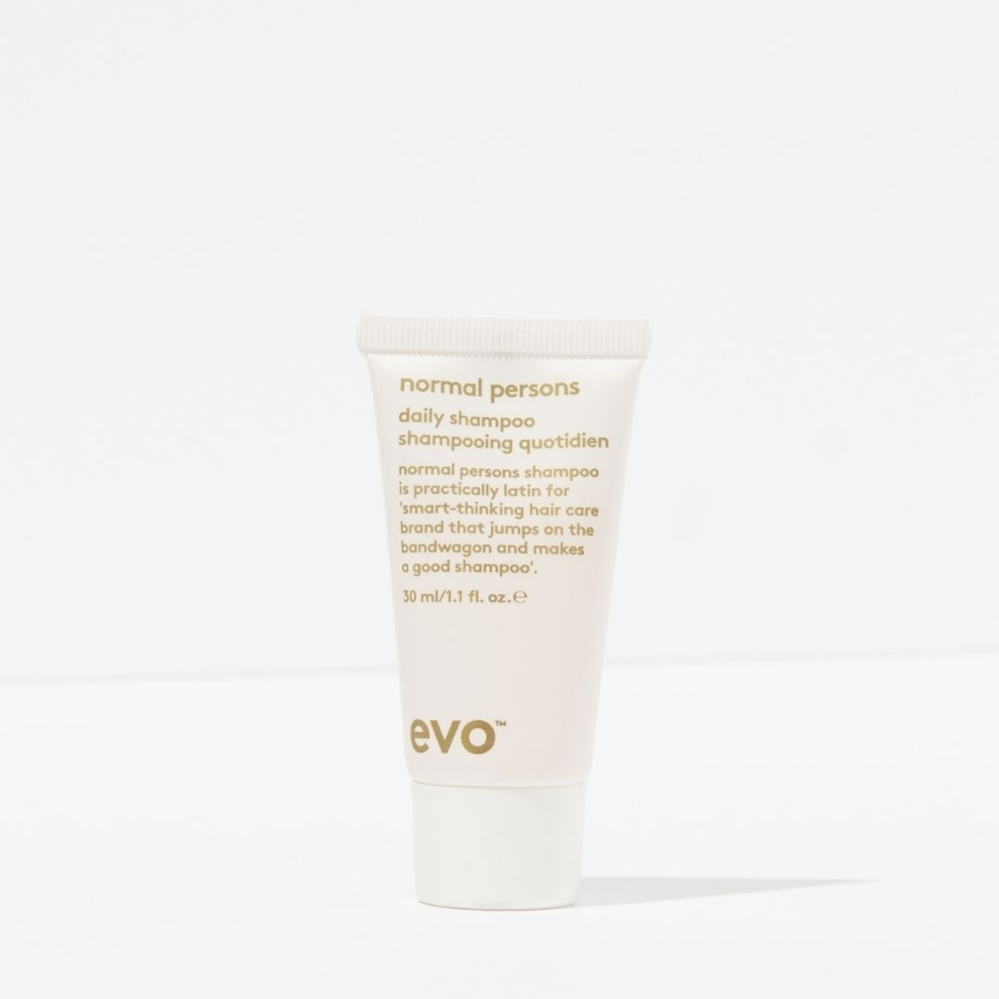 Tube of '30ml normal persons' shampoo by evo on a white background