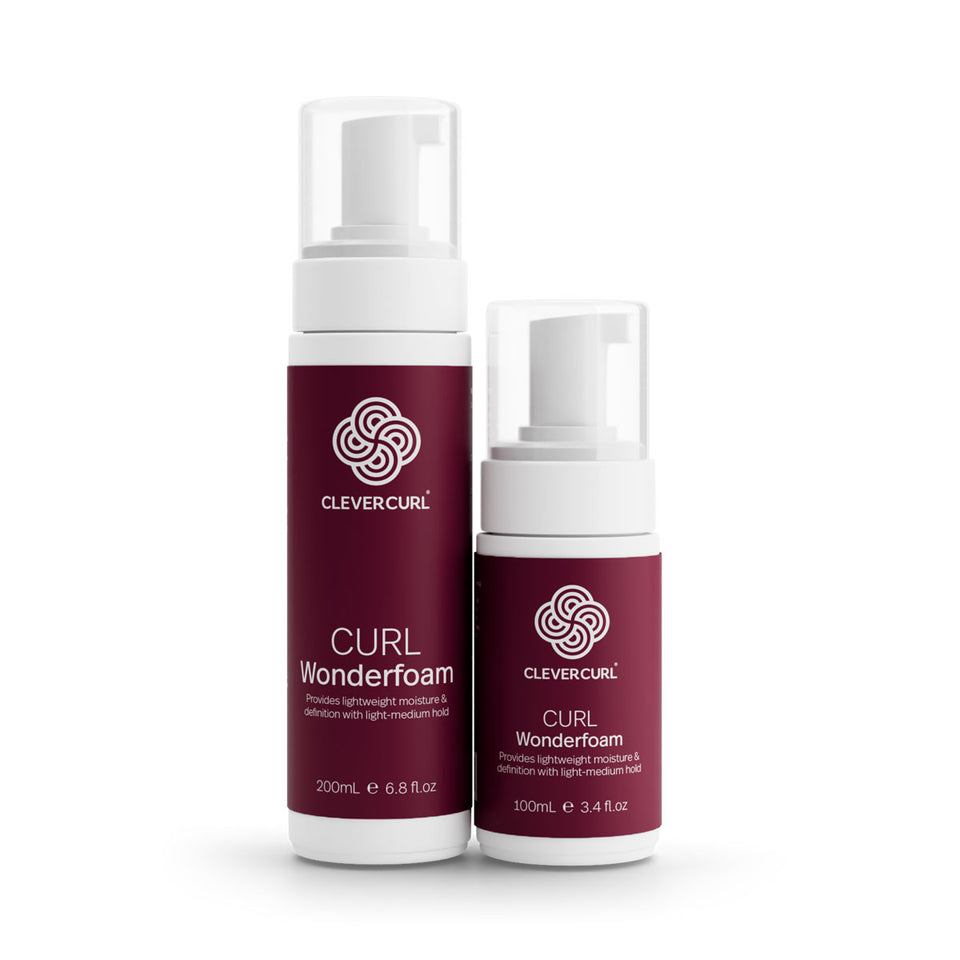 Two bottles of Clever Curl Wonderfoam on a white background