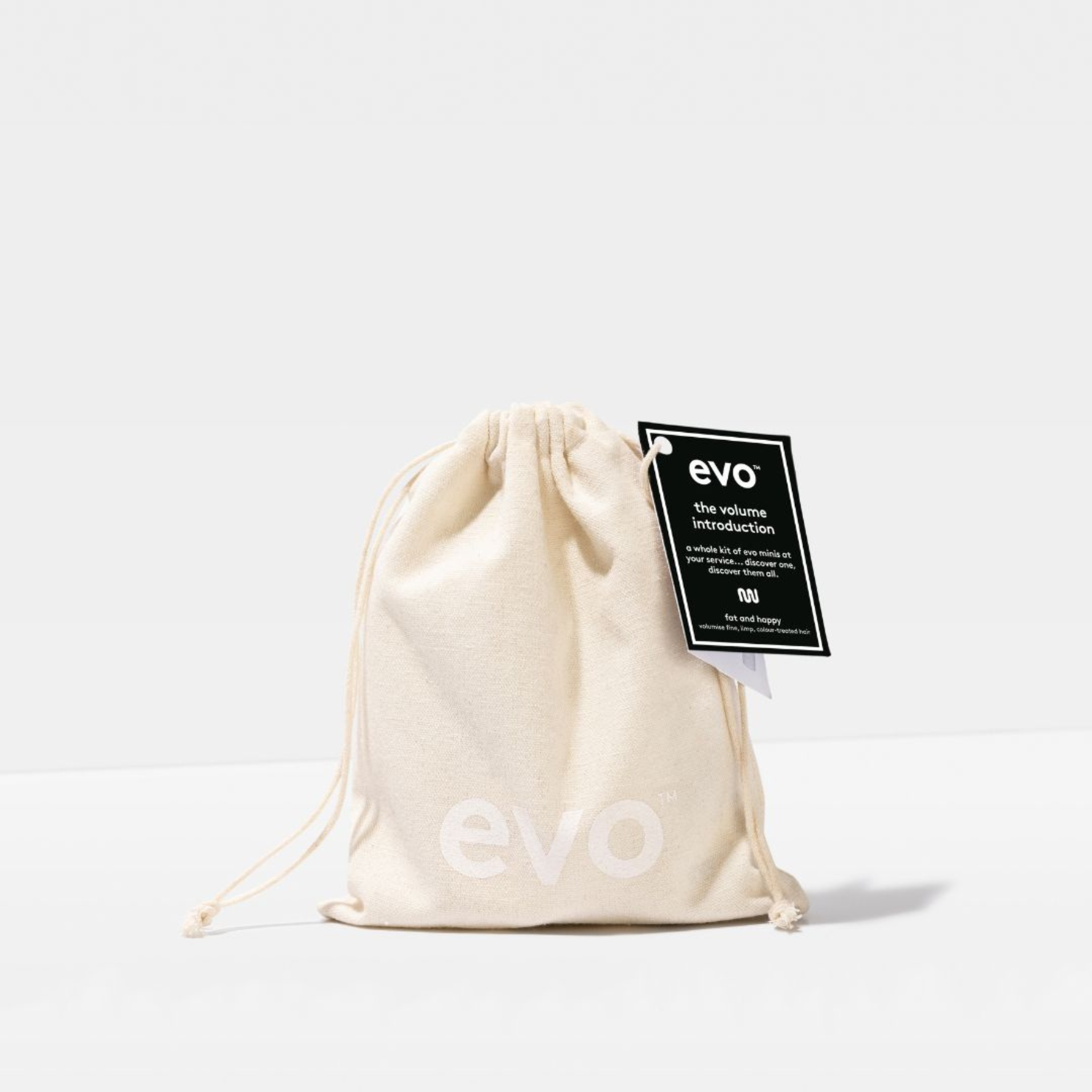 Beige drawstring bag with 'evo' branding on a light gray background